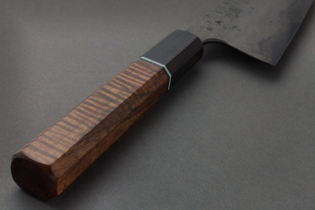 245 mm Carbon Steel Gyuto - Curly Koa, handle close-up