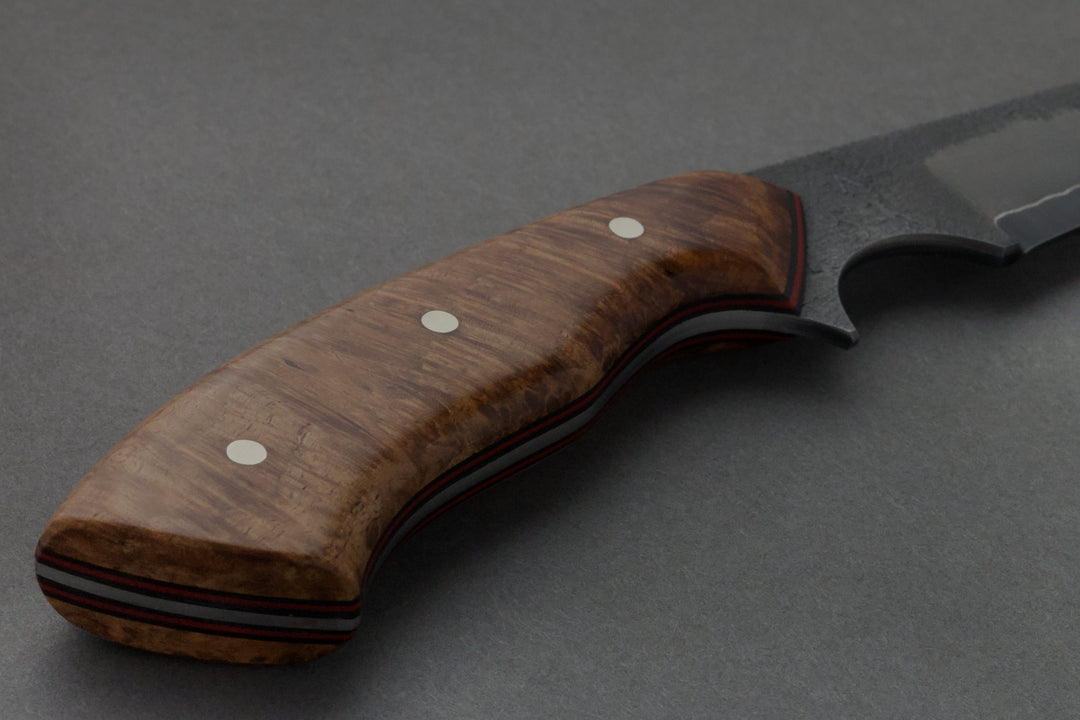 90 mm Carbon Steel Wharncliffe - Amboyna, handle close-up